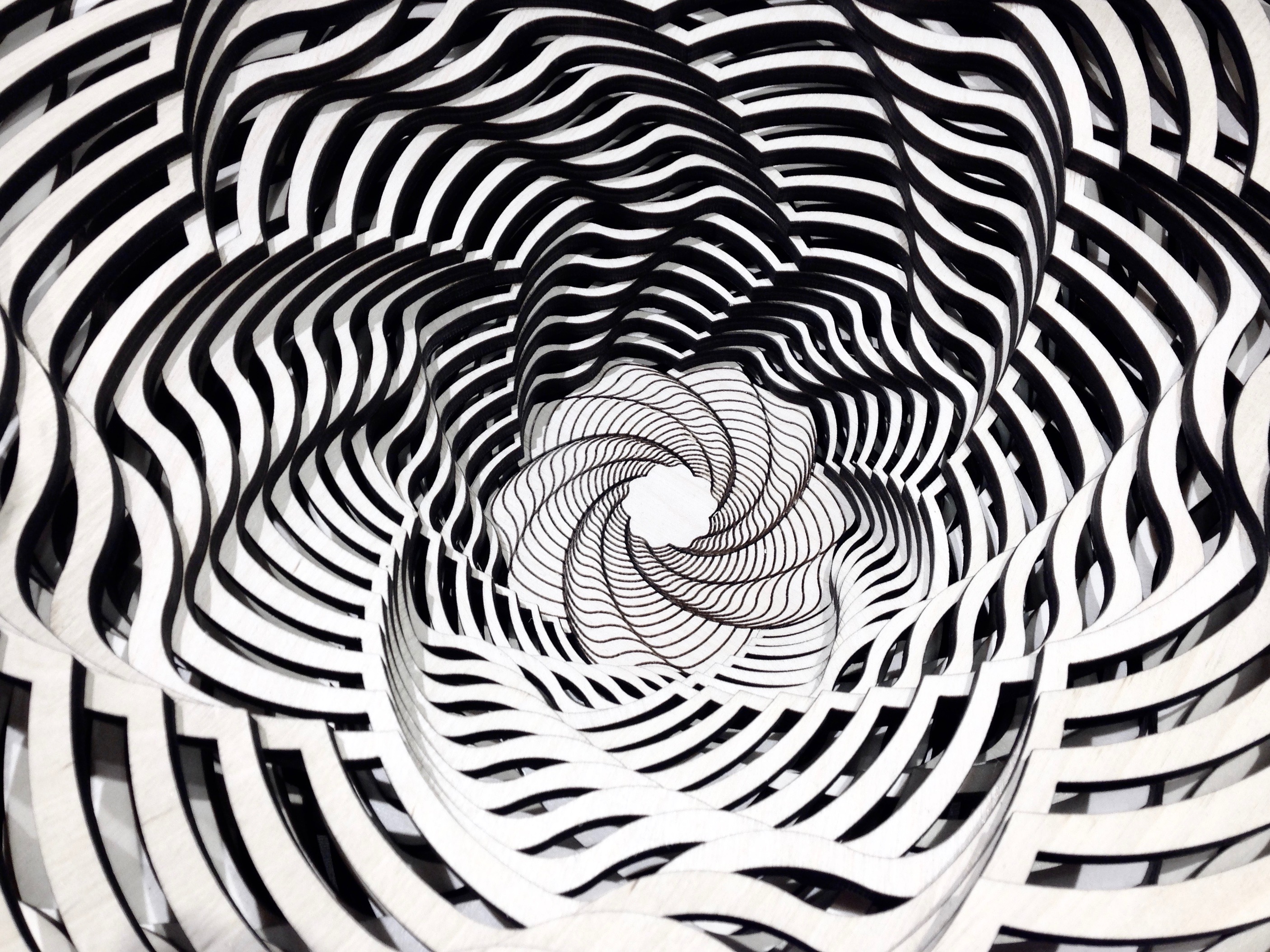 This is a pattern formed by a wooden bread basket in the DeYoung Museum gift shop. 